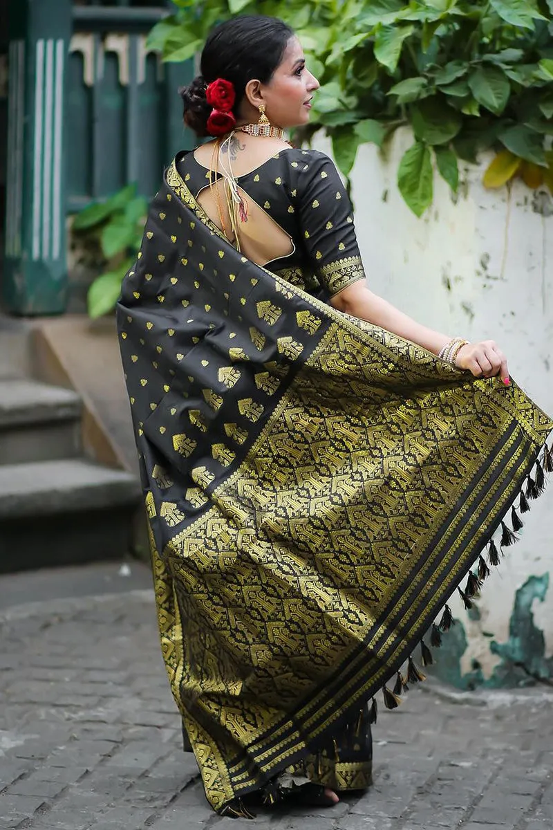 Enthralling Black Soft Silk Saree With Luminous Blouse Piece