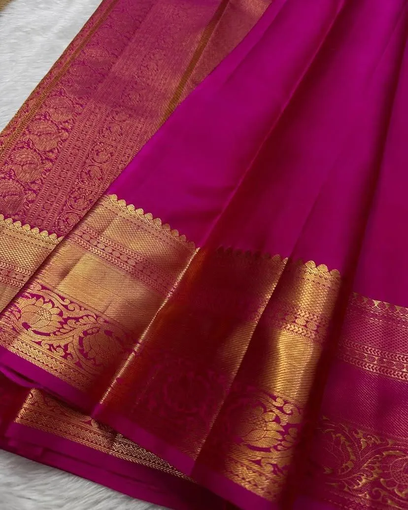 Ornate Dark Pink Soft Silk Saree With Exquisite Blouse Piece